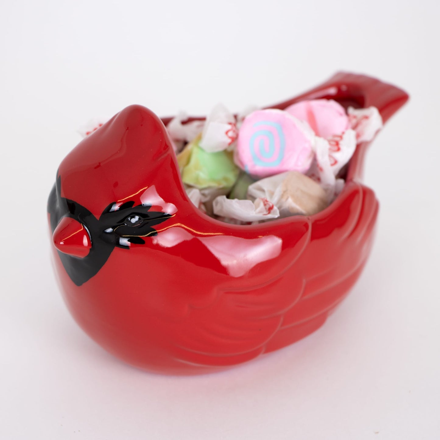 Glossy red ceramic bowl shaped like a cardinal filled with colorful taffy candies, handcrafted and perfect for Home & Decor, Kitchen & Food, Holiday Decor, Dinnerware, and Storage and Serving collections.