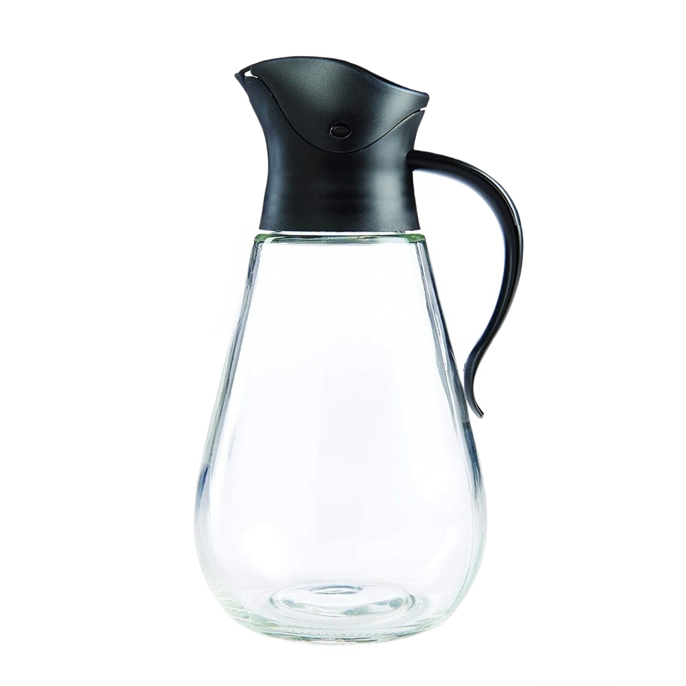 Clear glass syrup dispenser with ergonomic handle and gravity-style black lid that closes automatically when upright, ideal for Kitchen & Food, Storage and Serving, and Best Sellers collections.