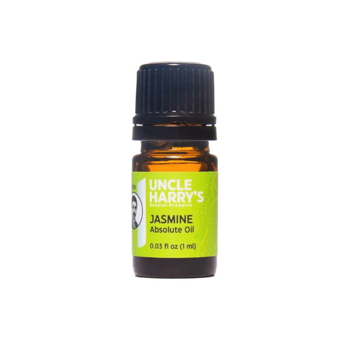 Small amber glass bottle of handcrafted jasmine absolute oil with green label, used in health remedies, soapmaking supplies, and USA made wellness collections.