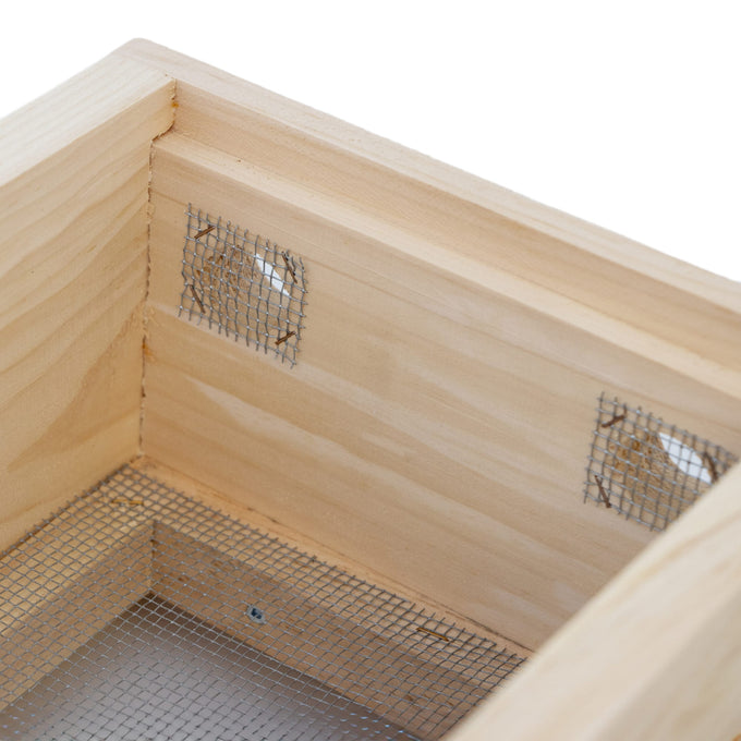 Close-up of a handcrafted wooden hive topper with metal mesh ventilation, designed to control moisture in beekeeping, made in USA and Amish made, featured in Farm, Garden & Tool collections.