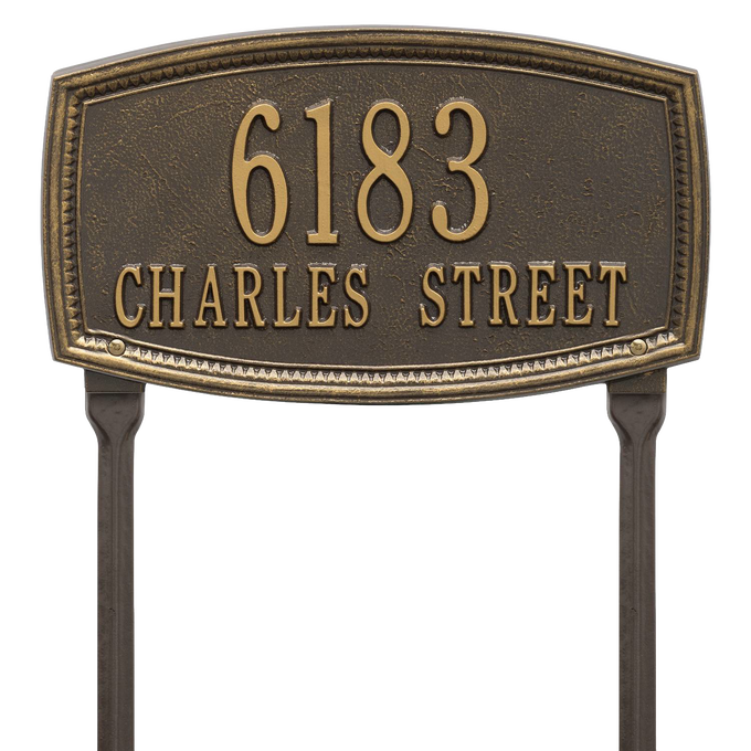 Custom handcrafted bronze lawn address plaque with raised border and two-line text on posts, made in USA, ideal for Home & Decor, Mailboxes and Address Signs, and Best Sellers collections.
