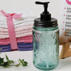 Reproduction blue-green Mason jar soap dispenser with black pump and embossed patent date, featuring a durable design ideal for Health & Wellness, Soaps, and Best Sellers collections.
