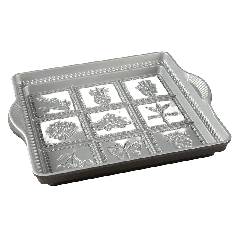 Cast aluminum baking pan with deep, detailed molds featuring floral, butterfly, and fruit designs, nonstick surface, handcrafted in USA for Kitchen & Food and Baking Supplies collections.