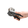 Hand holding a black and clear adjustable spice mill grinding fresh peppercorns, designed for easy one- or two-handed use, featured in Kitchen & Food, Dinnerware, and Kitchen Gadgets collections.