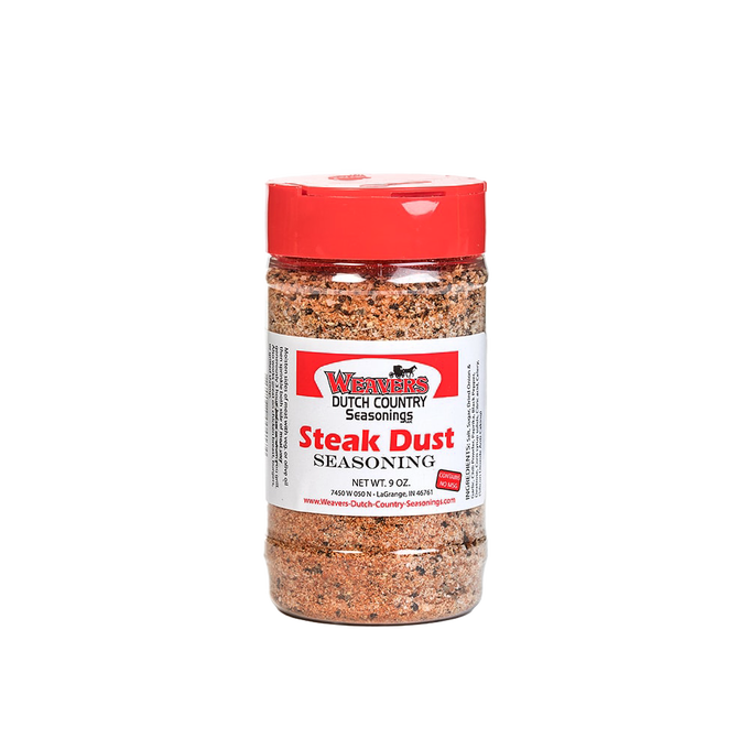 Clear shaker bottle of seasoned steak dust with red cap and labeled front, featuring a flavorful blend made in USA, perfect for Kitchen & Food, Pantry, and Best Sellers collections.