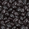 Close-up view of glossy jumbo black licorice jelly beans, showcasing their smooth texture and deep black color, featured in Kitchen & Food and Snacks and Sweets collections.