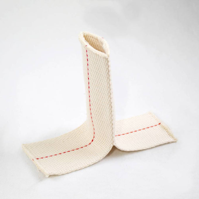 Handcrafted round wick with red stitching, designed for use in oil lamps with central draft tubes, featured in Lamps & Lighting, Parts and Accessories, Wicks and Mantles, and Best Sellers collections.