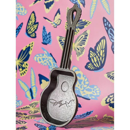 Mini cast iron skillet shaped like a guitar with a signed design, handcrafted in the USA, featured in Kitchen & Food, Cookware, Cast Iron, Best Sellers, and Promo Eligible collections.