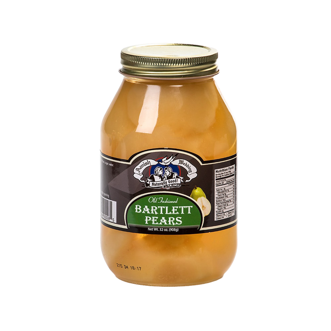 Clear glass jar filled with halved Bartlett pears in syrup, sealed with a gold metal lid, handcrafted and made in USA, featured in Kitchen & Food, Snacks and Sweets, Pantry, Best Sellers, and Promo Eligible collections.