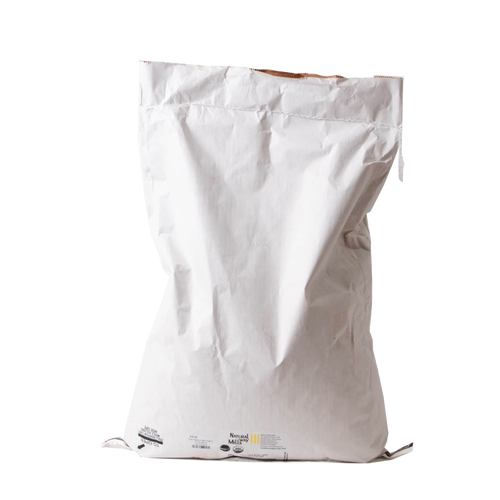 Large 25-pound white paper bag of organic hulled barley groats, USA grown, suitable for pantry, kitchen, and emergency supplies collections.