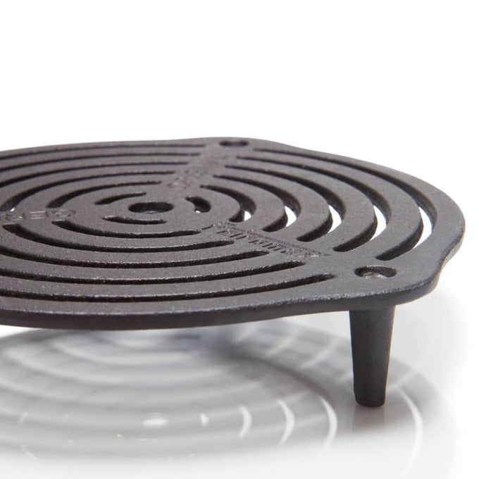 Round cast iron grate with three sturdy legs designed for superior heat management in Dutch ovens, ideal for Farm, Garden & Tool, Kitchen & Food, Camping, Cookware, Cast Iron, Best Sellers, and Promo Eligible collections.
