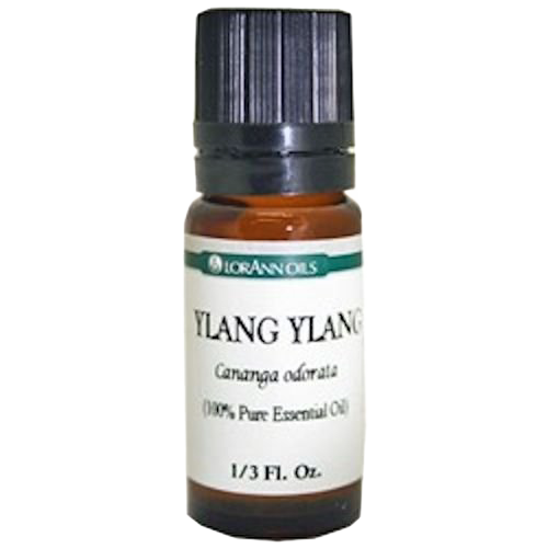 Amber glass bottle of pure Ylang Ylang essential oil with black cap, handmade and ideal for Health & Wellness, aromatherapy, soapmaking, and candlemaking supplies.
