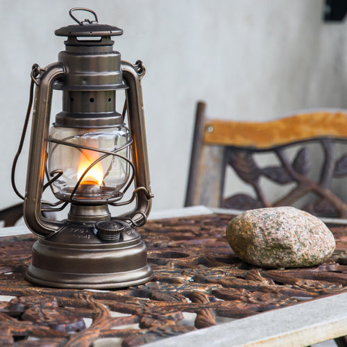 Handcrafted galvanized oil lantern with thermal heat-resistant SUPRAX glass globe, providing reliable light for camping, emergency supplies, and outdoor settings in lamps & lighting collections.