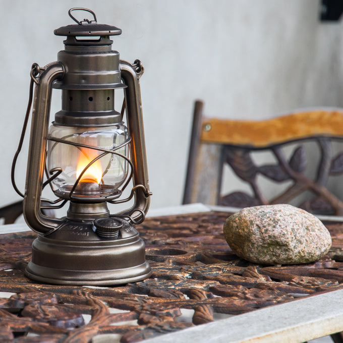 Handcrafted galvanized oil lantern with thermal heat-resistant SUPRAX glass globe, providing reliable light for camping, emergency supplies, and outdoor settings in lamps & lighting collections.