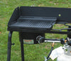 Small cast iron grill/griddle with ridged surface set on a portable propane burner, suited for outdoor cooking in Kitchen & Food, Cast Iron, Cookware, and Stoves collections.