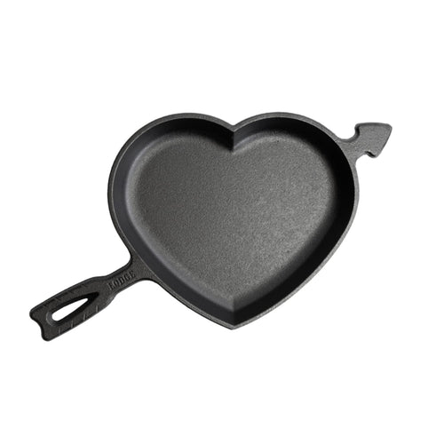 Handcrafted cast iron heart-shaped skillet with arrow detail, made in USA, perfect for baking and cooking unique meals, featured in Kitchen & Food, Cookware, Cast Iron, and Best Sellers collections.