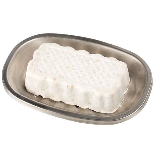 Handcrafted white jewelweed soap bar with a textured surface, resting on a simple metal soap dish, featured in Health & Wellness and USA Made collections.