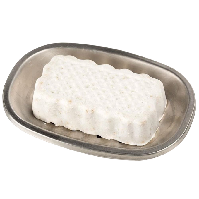 Handcrafted white jewelweed soap bar with a textured surface, resting on a simple metal soap dish, featured in Health & Wellness and USA Made collections.
