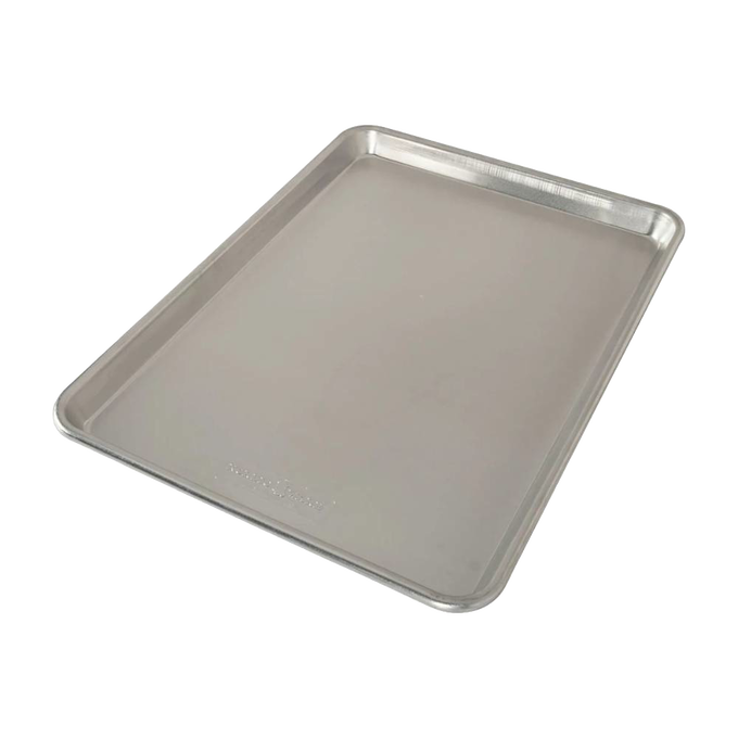 Lightweight aluminum half sheet baking pan with raised edges and smooth finish, designed for even heat distribution, featured in Kitchen & Food, Cookware, and Baking Supplies collections.