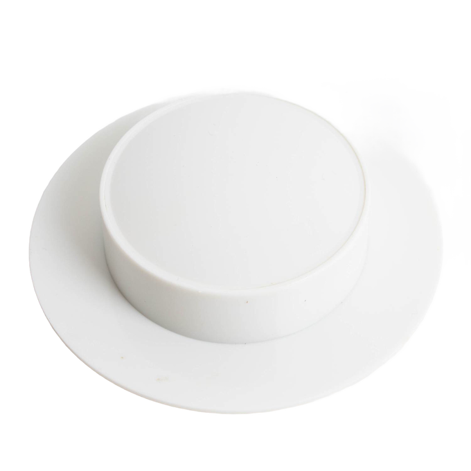 White plastic vegetable holder designed to safely grip produce while slicing, compatible with Kitchen & Food, Food Prep, Choppers and Cutters, Best Sellers, and Promo Eligible collections.
