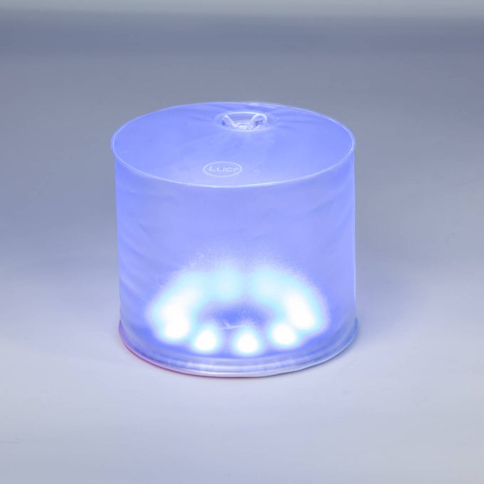 Soft blue illuminated inflatable LED solar light with compact, portable design ideal for camping, emergency preparedness, and outdoor farm, garden & tool lighting.