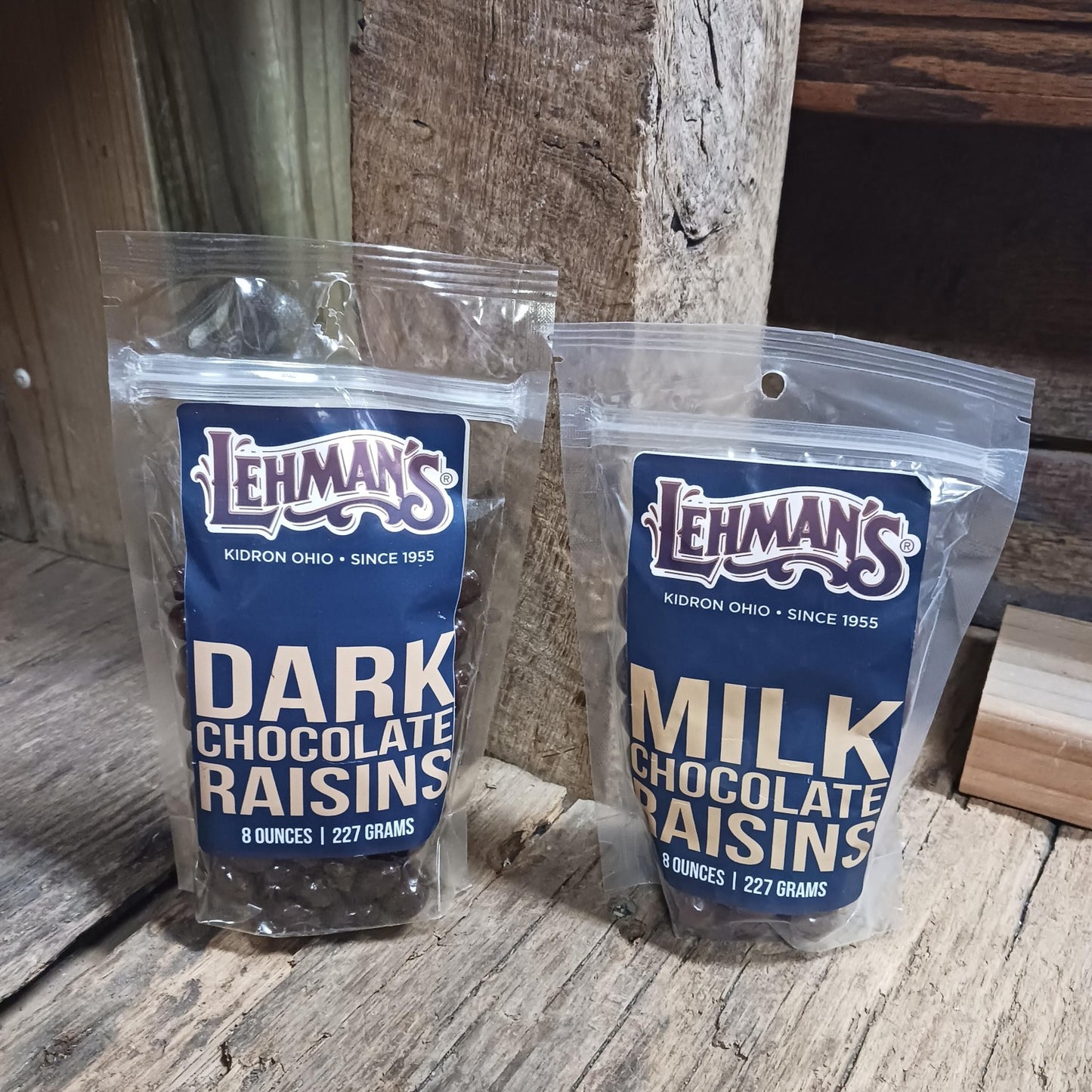 Two resealable bags of Amish made dark and milk chocolate covered raisins, ideal snack treats featured in Kitchen & Food, Snacks and Sweets, and USA Made collections.