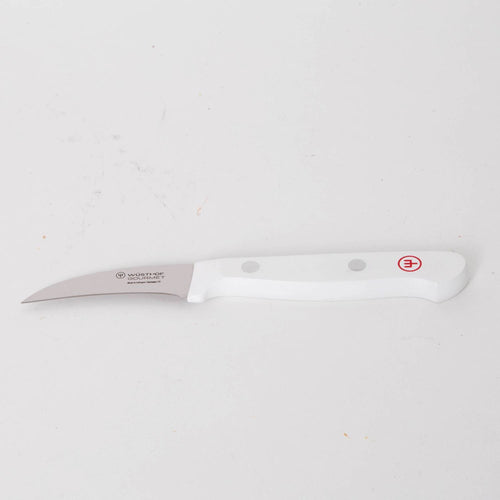 Curved paring knife with a stainless steel blade and ergonomic white handle featuring rivet accents, designed for detailed food prep in Kitchen & Food and Food Prep collections.