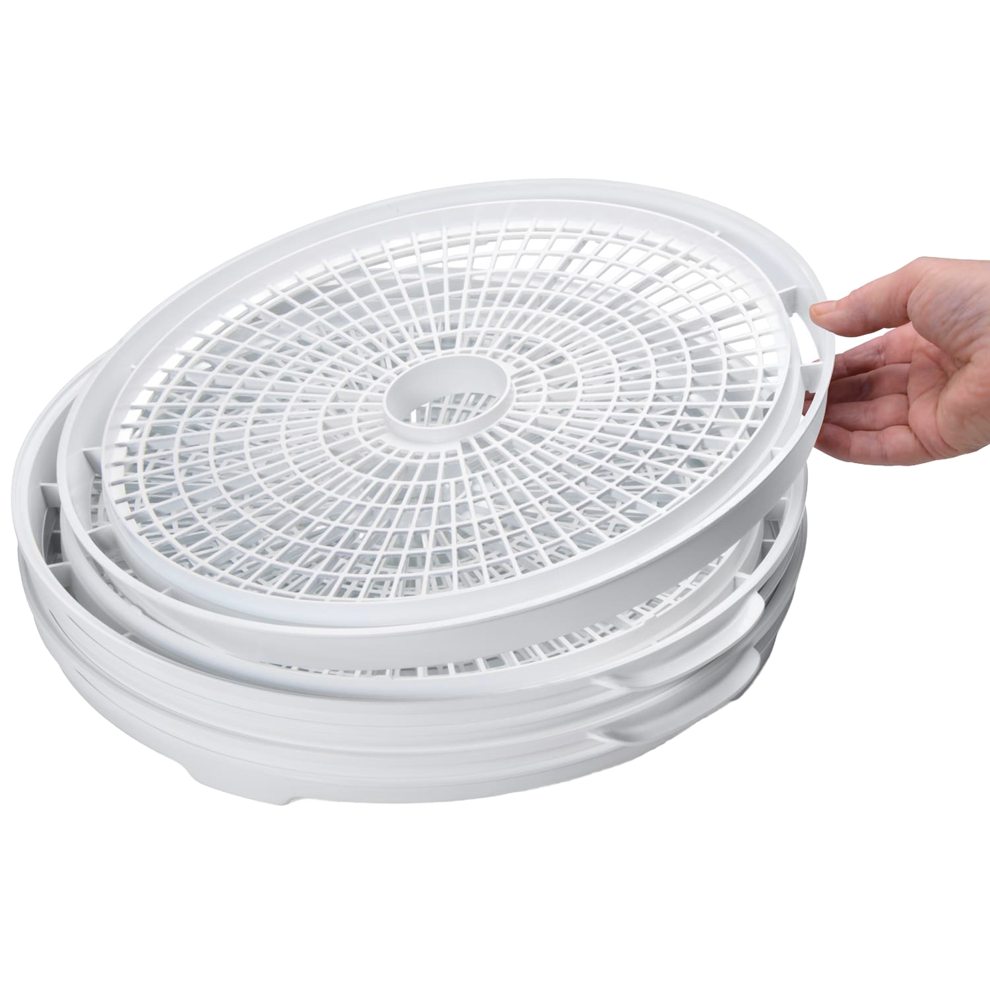 Stack of white nesting trays designed for a compact electric food dehydrator, shown being handled gently, ideal for Kitchen & Food, Food Preservation, Drying, and Best Sellers collections.