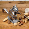 Handcrafted cast aluminum nutcracker shaped like a playful squirrel, designed for cracking pecans, almonds, and walnuts, ideal for Kitchen & Food, Food Prep, Choppers and Cutters, Best Sellers, and Promo Eligible collections.