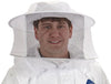 Man wearing a poly-cotton blend beekeeping hat with veil that fits snugly with elastic under the arms, designed for clear vision and protection while working with hives, featured in Farm, Garden & Tool, Beekeeping Supplies, Beekeeping Tools and Gear, Clothing and Accessories, Best Sellers, and Promo Eligible collections.