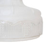 Close-up of a clear glass lamp shade with embossed textured pattern along the bottom edge, designed for lamps and lighting, ideal as a part and accessory and featured in best sellers and promo eligible collections.