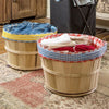 Two handcrafted bushel baskets lined with gingham-patterned reusable liners in a cozy laundry room, part of Home & Decor and Laundry Supplies collections.