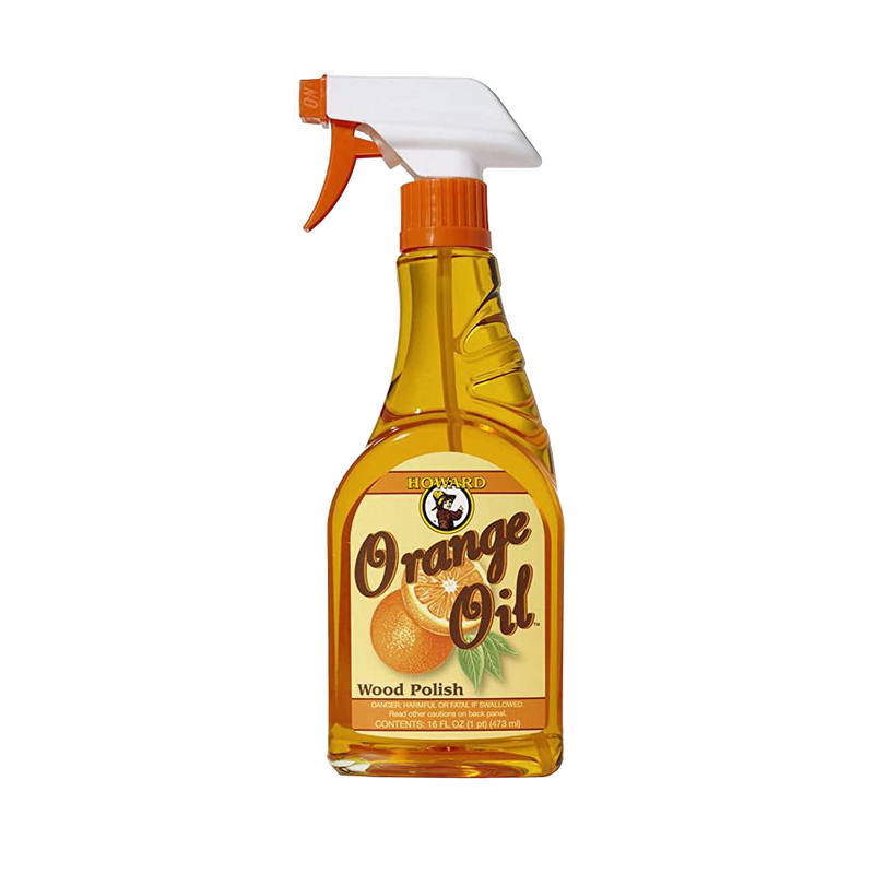 Clear spray bottle of handcrafted orange oil wood polish made in USA, conditioning and enhancing wood surfaces with a natural glow, ideal for home decor and cleaning collections.