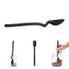 Flexible black silicone spoon with an angled handle designed for scraping and measuring, shown with jars for cooking and baking in Kitchen & Food and Measuring collections.