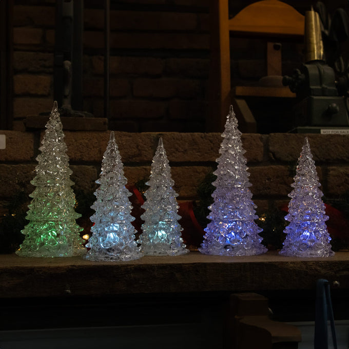 Set of five clear acrylic Christmas trees softly glowing in color-changing LED lights from green to blue and purple, perfect for indoor holiday decor in Home & Decor and Holiday collections.