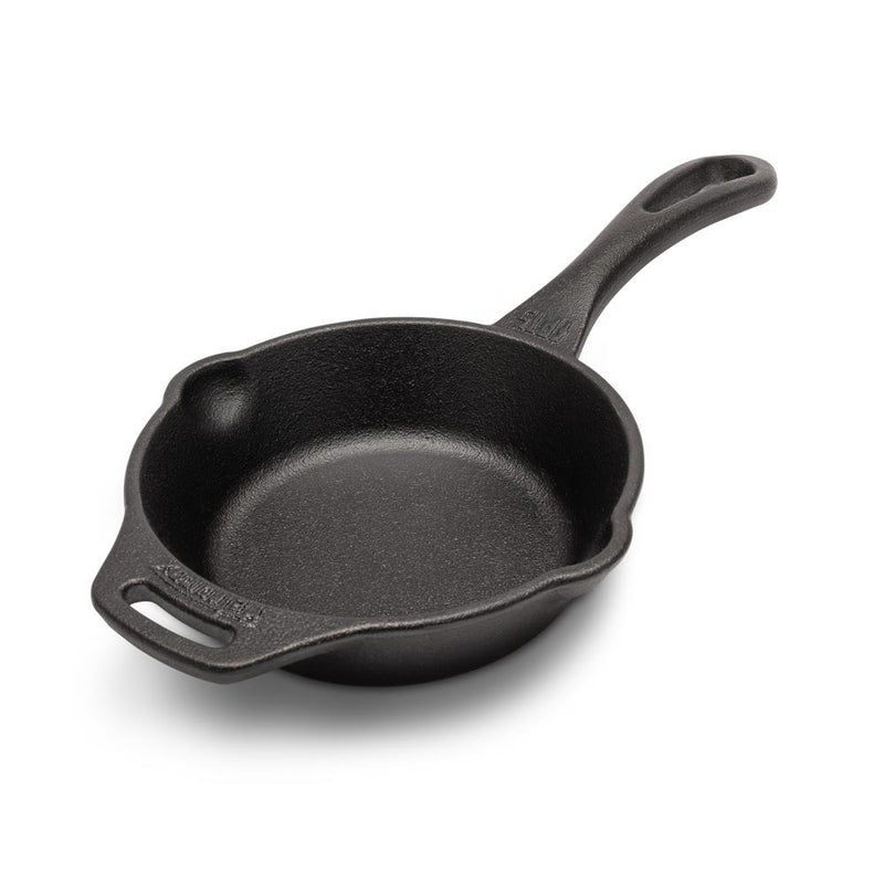 Durable cast iron skillet with an extended handle and helper grip, designed for versatile cooking at home, camping, and outdoor use, featured in Farm, Garden & Tool, Kitchen & Food, Camping, Cookware, Cast Iron, and Best Sellers collections.