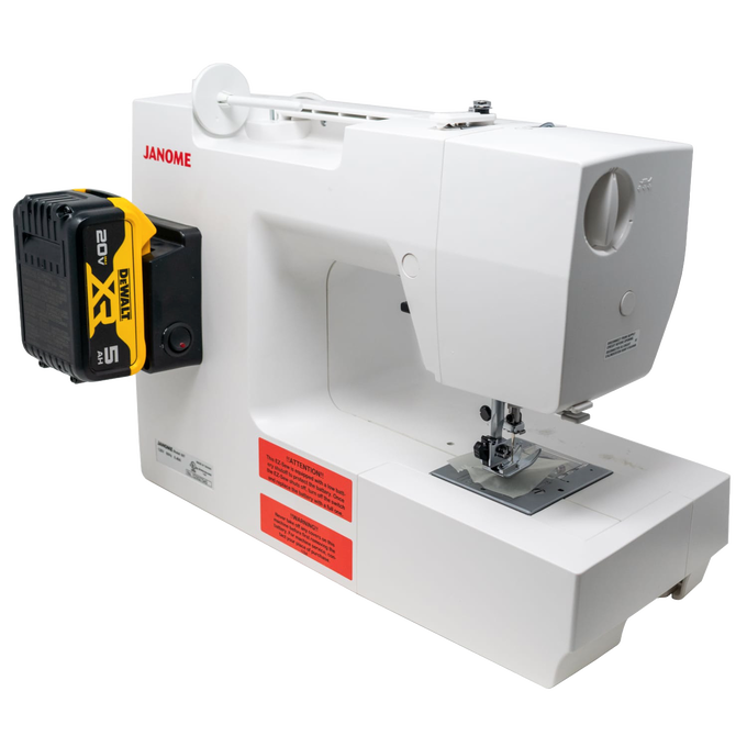 Compact white mechanical sewing machine equipped with a yellow and black tool battery, designed for extended use in sewing and quilting, farm and garden, and homesteading collections.