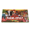 Colorful farm-themed board game box featuring various animals like cows, pigs, chickens, and horses around a red barn, handcrafted and made in USA, ideal for children's toys and games collections.