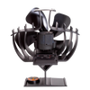 Black heat-powered oscillating stove fan with curved blades and protective finned guard, designed to circulate warm air efficiently, ideal for stoves and hearth accessories collections.