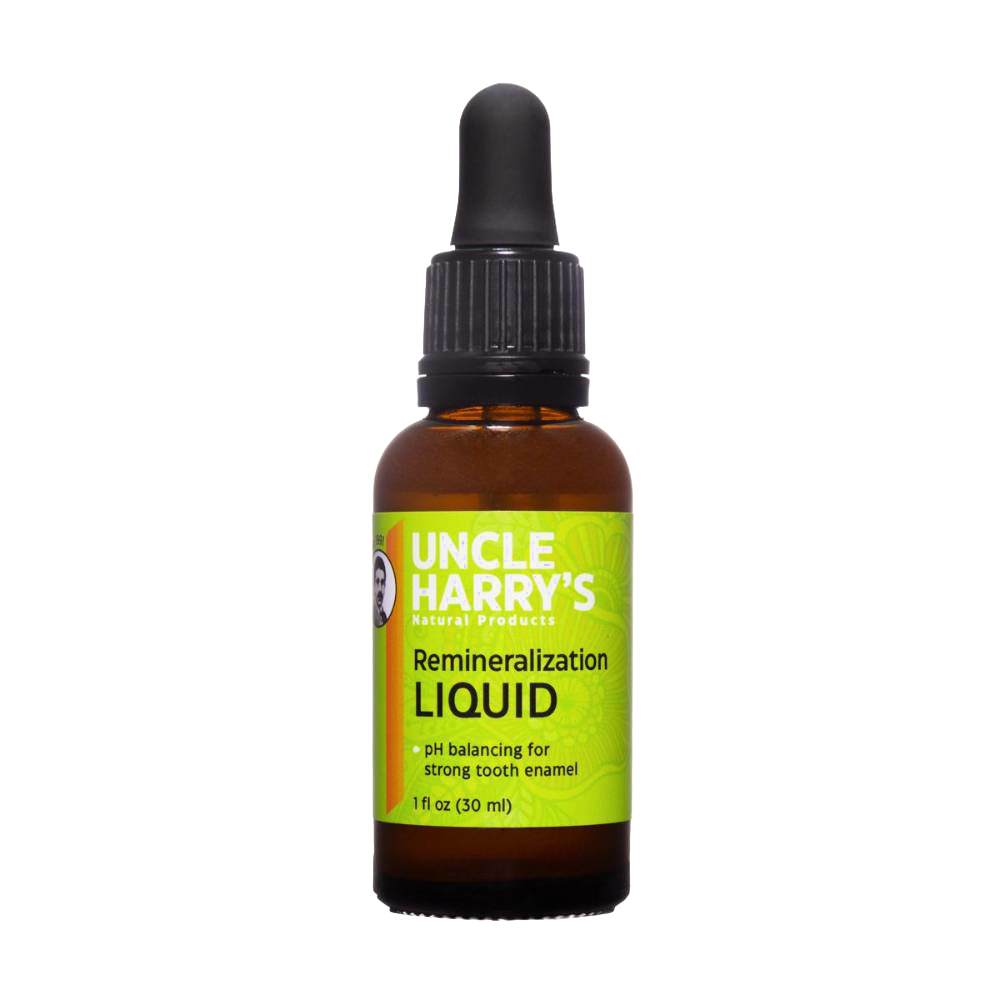 Amber glass bottle of Uncle Harry's remineralization liquid with green label and black dropper cap, promoting strong tooth enamel, USA made and vegan-friendly supplement.