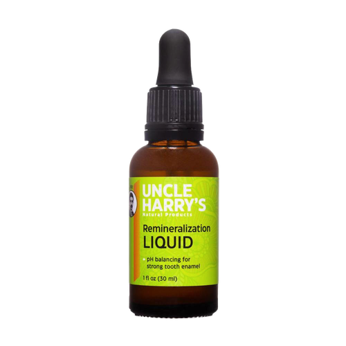 Amber glass bottle of Uncle Harry's remineralization liquid with green label and black dropper cap, promoting strong tooth enamel, USA made and vegan-friendly supplement.