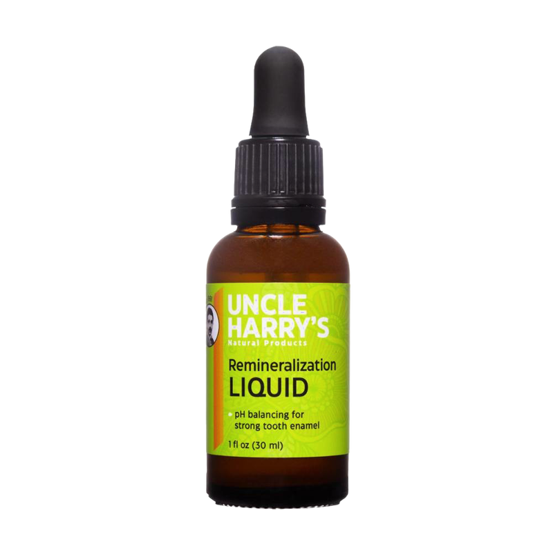 Amber glass bottle of Uncle Harry's remineralization liquid with green label and black dropper cap, promoting strong tooth enamel, USA made and vegan-friendly supplement.
