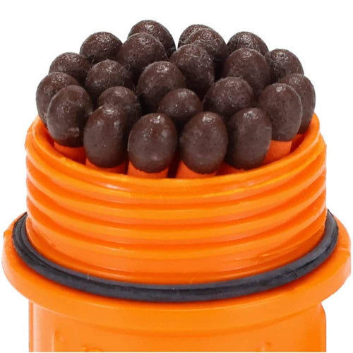 Close-up of waterproof orange container holding tightly packed dark brown weather-resistant match heads, designed for reliable outdoor use in Camping, Emergency Supplies, and Farm, Garden & Tool collections.