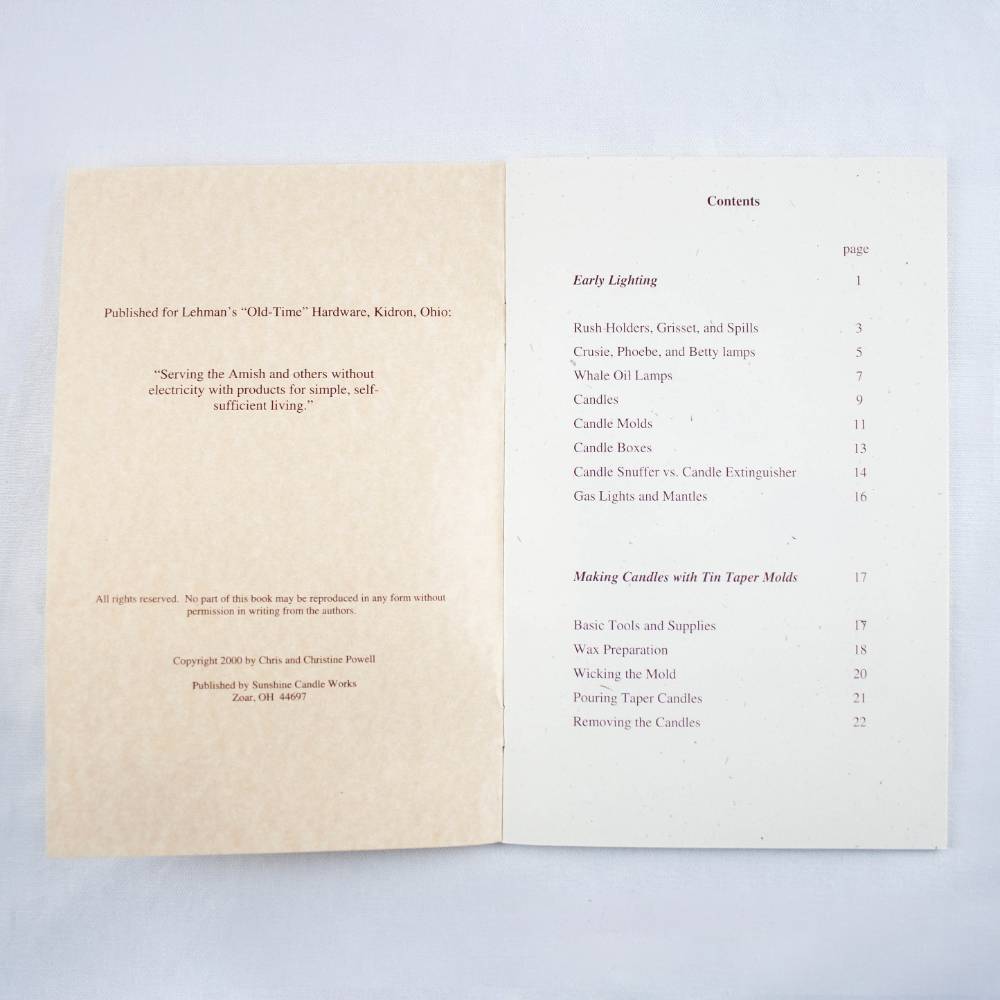 Open booklet showing table of contents listing early lighting methods, candle molds, candle making tools, and instructions, handcrafted and featured in Lamps & Lighting and Candlemaking Supplies collections.