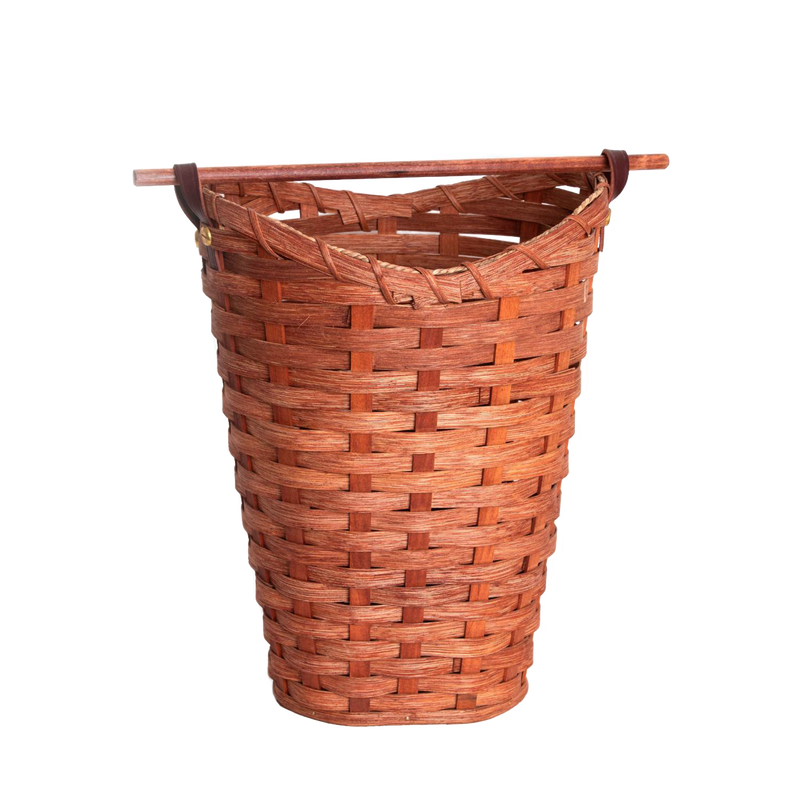 Handwoven maple wood basket with a birch dowel rod for dispensing, designed to hold four standard toilet paper rolls, handcrafted in the USA and featured in Home & Decor and Amish Made collections.