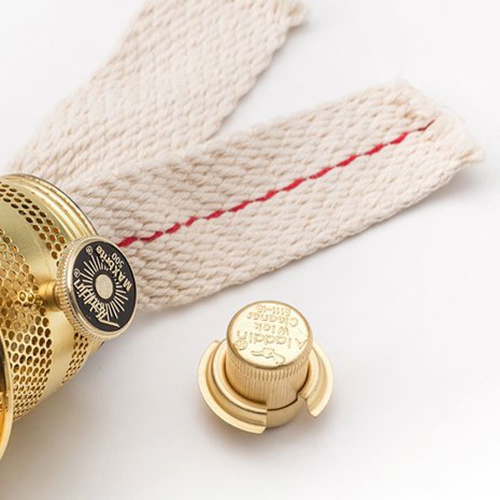 Close-up of a polished brass lamp burner with adjustment knob and braided cotton wick, part of the Lamps & Lighting, Lamp Burners and Collars, Parts and Accessories collections, featured among Best Sellers and Promo Eligible items.