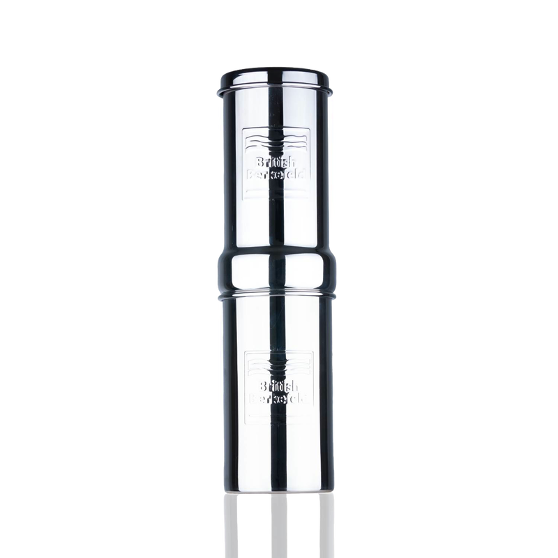Compact stainless steel gravity water filter with embossed branding, designed for portable use in camping, emergency supplies, and farm and garden collections.