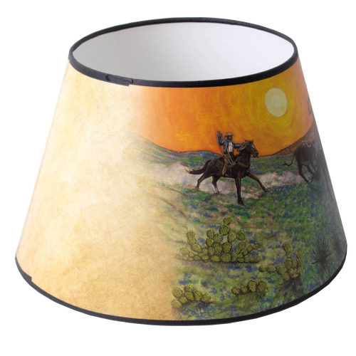 Southwestern-inspired parchment oil lamp shade with handcrafted artwork of horse riders at sunset, designed to soften light for lamps in Lamps & Lighting and Accessories collections.