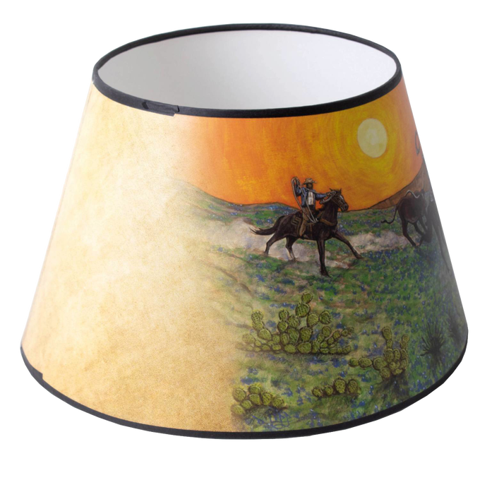 Southwestern-inspired parchment oil lamp shade with handcrafted artwork of horse riders at sunset, designed to soften light for lamps in Lamps & Lighting and Accessories collections.