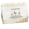 Handcrafted bar soap featuring emu oil and Dead Sea salt, wrapped in a natural label with rustic emu illustration, ideal for Health & Wellness and USA Made grooming collections.